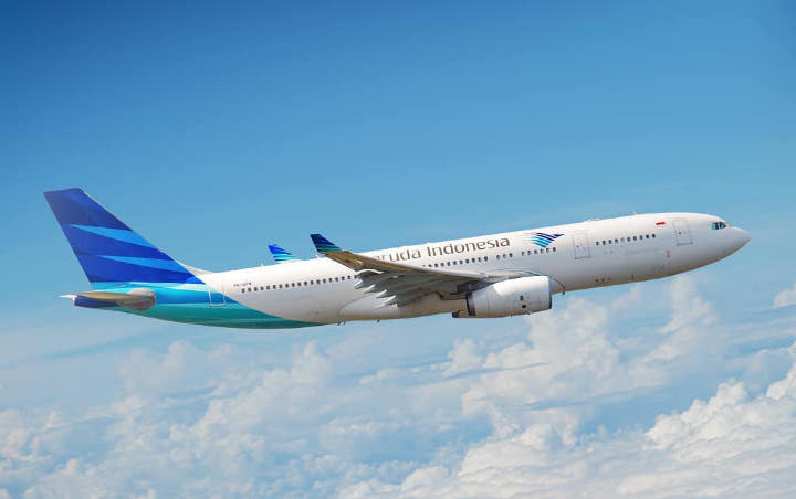 Garuda Klarifikasi Larangan Memotret di Pesawat, Sebut Penumpang Bisa Ambil Gambar dengan 1 Syarat