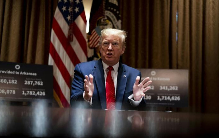 Trump Yakin Virus Corona Hilang Dengan Sendirinya Meski Kasus di AS Terus Melonjak Tajam