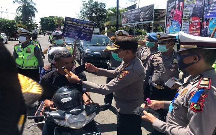Pemkot Surabaya Gelar Razia Tertib Masker, Puluhan Pelanggar Dihukum Nyanyi Hingga KTP Disita