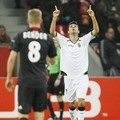 Pemain Valencia, Jonas, melakukan selebrasi atas golnya ke gawang Leverkusen