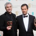 Alfonso Cuaron dan David Heyman Terima Piala Outstanding British Film Untuk ' Gravity'