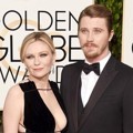 Kirsten Dunst dan Garrett Hedlund di Red Carpet Golden Globes Awards 2016