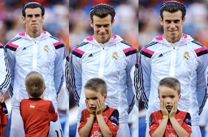 Ekspresi Lucu Seorang Bocah Saat Dampingi Gareth Bale